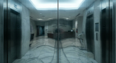 Distorted reflection in elevator doors inside building hallway